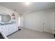 Neutral Bedroom with changing table and decor shelves for storage at 807 Parker Pass, Peachtree City, GA 30269
