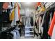 Spacious walk-in closet with shelving and cart organizer for ample storage at 807 Parker Pass, Peachtree City, GA 30269