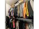 Organized walk-in closet featuring double hanging rods and ample shelving for storage at 807 Parker Pass, Peachtree City, GA 30269
