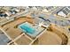 Aerial view of a neighborhood pool featuring crystal-clear water and a well-maintained surrounding area at 807 Parker Pass, Peachtree City, GA 30269