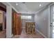 Charming dining area with a small table, stools, and natural light at 3156 Pope Rd, Douglasville, GA 30135