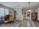 Spacious living area with hardwood floors and a view of the Kitchen at 3156 Pope Rd, Douglasville, GA 30135