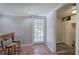 Mud room with brick floors and view of pantry at 3156 Pope Rd, Douglasville, GA 30135