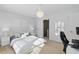 Cozy bedroom features a comfortable bed, ample lighting, and neutral decor at 3754 Berkeley Xing, Duluth, GA 30096
