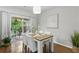 Cozy dining area with sliding doors to the backyard at 3754 Berkeley Xing, Duluth, GA 30096