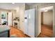 Open kitchen layout with modern appliances and views into the dining and living spaces, great for entertaining at 2556 Defoors Ferry Nw Rd, Atlanta, GA 30318