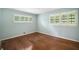 This bedroom offers hardwood floors and plantation shutters at 2559 Defoors Ferry Nw Rd, Atlanta, GA 30318