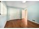 The bedroom has a closet with sliding doors and plantation shutters at 2559 Defoors Ferry Nw Rd, Atlanta, GA 30318