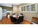 Cozy dining area with wood floors, natural light, and traditional decor at 2559 Defoors Ferry Nw Rd, Atlanta, GA 30318