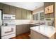 Functional kitchen features ample counter space, vintage cabinets, and modern appliances at 2559 Defoors Ferry Nw Rd, Atlanta, GA 30318