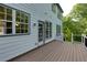 Wooden deck with railing that offers an outdoor space, enhancing the home's living area at 3260 Ridgefair Dr, Cumming, GA 30040