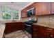 This is a kitchen with stainless steel appliances, granite counter tops, and lots of cabinet space at 3260 Ridgefair Dr, Cumming, GA 30040