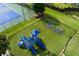 The community has a playground and tennis courts for neighborhood activities at 3260 Ridgefair Dr, Cumming, GA 30040