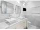 Bathroom boasts marble tile, vessel sinks, modern fixtures, and a sleek, minimalist design at 660 Glen Iris Dr # 206 & 109, Atlanta, GA 30308
