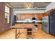 Spacious kitchen featuring stainless steel appliances, modern finishes, and an island at 660 Glen Iris Dr # 206 & 109, Atlanta, GA 30308