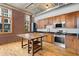Modern kitchen featuring stainless steel appliances and hardwood floors at 660 Glen Iris Dr # 206 & 109, Atlanta, GA 30308