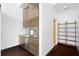 This kitchenette is equipped with modern cabinets, a built-in stainless steel microwave, and stainless steel refrigerator at 660 Glen Iris Dr # 206 & 109, Atlanta, GA 30308