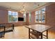 Spacious living area with exposed brick walls, hardwood flooring, and updated kitchen at 660 Glen Iris Dr # 206 & 109, Atlanta, GA 30308