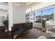 Modern lobby area with stylish decor, a reception desk, and large windows at 660 Glen Iris Dr # 206 & 109, Atlanta, GA 30308