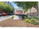 Glen Iris Lofts signage with landscaping and entrance at 660 Glen Iris Dr # 206 & 109, Atlanta, GA 30308