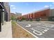 Ponce City Market from street level on a sunny day; stop sign visible at 660 Glen Iris Dr # 206 & 109, Atlanta, GA 30308