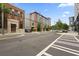 Modern apartment building, showcasing its unique architecture and streetscape in an urban setting, with a bright sunny day at 660 Glen Iris Dr # 206 & 109, Atlanta, GA 30308