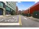 Street view of building with painted arrows on the road and loading dock on the right at 660 Glen Iris Dr # 206 & 109, Atlanta, GA 30308