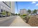 Street view of building with sidewalk and professional landscaping at 660 Glen Iris Dr # 206 & 109, Atlanta, GA 30308
