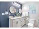 Modern bathroom featuring double vanity, granite countertop and a clean design at 999 Washington Sw St, Atlanta, GA 30315