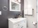 Modern bathroom featuring stylish vanity with white countertop and modern fixtures at 999 Washington Sw St, Atlanta, GA 30315