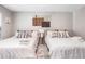 Comfortable bedroom featuring two beds with stylish decor and natural lighting at 999 Washington Sw St, Atlanta, GA 30315