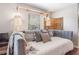 Cozy bedroom featuring a daybed with decorative pillows and woven pendant lights at 999 Washington Sw St, Atlanta, GA 30315