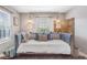 Charming bedroom featuring a daybed with decorative pillows and unique lighting fixtures at 999 Washington Sw St, Atlanta, GA 30315