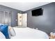 Bedroom featuring a closet, a modern tv and a view to another room at 999 Washington Sw St, Atlanta, GA 30315