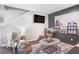 Relaxing living room featuring stylish seating, a modern TV, and inviting decor at 999 Washington Sw St, Atlanta, GA 30315
