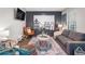Spacious living room featuring modern decor, comfortable seating, and natural light at 999 Washington Sw St, Atlanta, GA 30315
