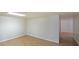 Spacious, finished basement with laminate flooring, ready to customize to your needs at 1001 Wiley Bridge Rd, Woodstock, GA 30188
