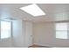 Finished basement bedroom with lots of natural light from windows and wood laminate flooring at 1001 Wiley Bridge Rd, Woodstock, GA 30188