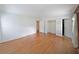 Spacious bedroom with hardwood floors and ample closet space at 1001 Wiley Bridge Rd, Woodstock, GA 30188