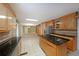 Spacious kitchen with granite countertops, stainless steel appliances, and an island at 1001 Wiley Bridge Rd, Woodstock, GA 30188