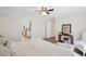 Well-lit bedroom shows doorway to kitchen, connecting living spaces for convenience at 1796 Center Ave, East Point, GA 30344