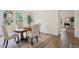 Bright dining room with hardwood floors and ample natural light at 1796 Center Ave, East Point, GA 30344