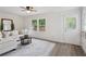 Inviting living room with white walls, comfortable seating, and natural light at 1796 Center Ave, East Point, GA 30344
