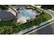 Aerial view of the community pool with lounge area and landscaped surroundings at 208 Maycrest Path, Tucker, GA 30084