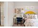 Brightly decorated bedroom with sunny yellow accents, cozy textures and an adjacent bathroom at 208 Maycrest Path, Tucker, GA 30084
