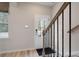 Charming entryway featuring black railings and a front door with sidelights at 208 Maycrest Path, Tucker, GA 30084