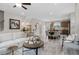 Inviting living room adjacent to the kitchen and dining area, with stylish decor and ample seating at 208 Maycrest Path, Tucker, GA 30084