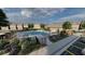 Community swimming pool with lounge seating, landscaping, and nearby parking at 208 Maycrest Path, Tucker, GA 30084