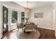 Charming eat-in area with natural light and a view of the backyard deck at 5600 Surrey Ct, Alpharetta, GA 30009