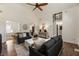 Spacious living area with hardwood floors, modern furnishings, and an open layout at 5600 Surrey Ct, Alpharetta, GA 30009